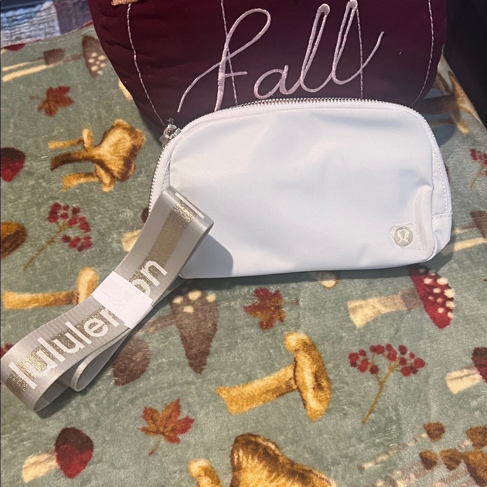 Lululemon Gold /white Wristlet with Mesh Interior